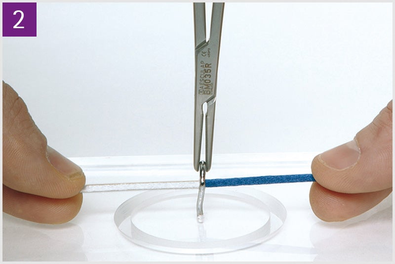 02_Ligation around haemostatic clamp Common technique